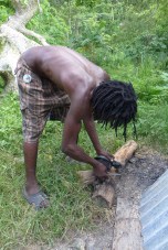 scraping the burnt breadfruit